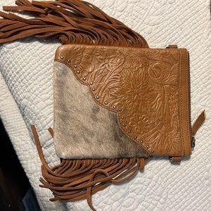 New without Tags Montana West crossbody with fringe.